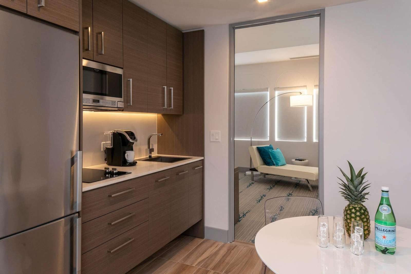 Refrigerator, microwave and coffee maker in a Cruz Bay suite kitchenette